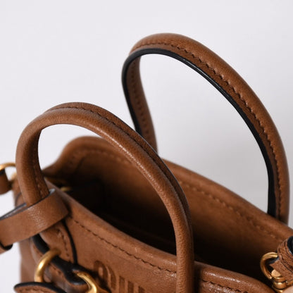 Miu Miu Aventure Micro Top Handle Bag Nappa Leather Brown Gold — view 7