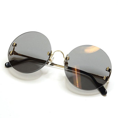 Cartier Decor C Sunglasses 001 Gray Gold Black Round Rimless Eyewear — view 2