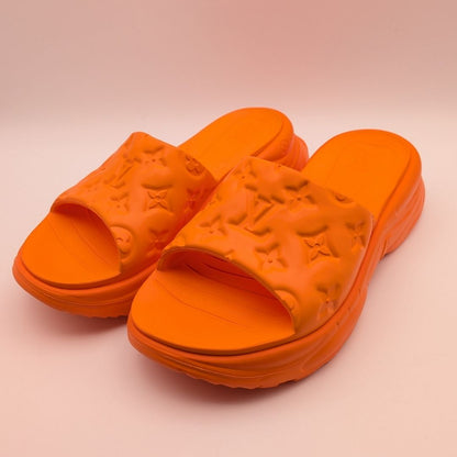 Louis Vuitton Monogram Embossed Orange Rubber Sandals