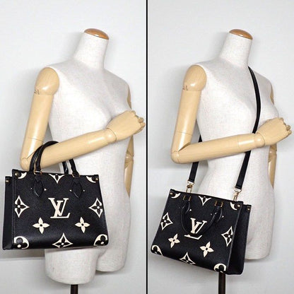 Louis Vuitton Shoulder Bag On The Go PM Black Bicolor Monogram Empreinte Gold — view 8