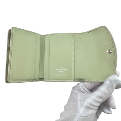 Louis Vuitton Portefeuille Iris XS Mahina Reverse Leather Trifold Wallet Beige — view 6