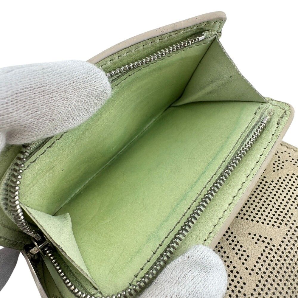 Louis Vuitton Portefeuille Iris XS Mahina Reverse Leather Trifold Wallet Beige — view 7