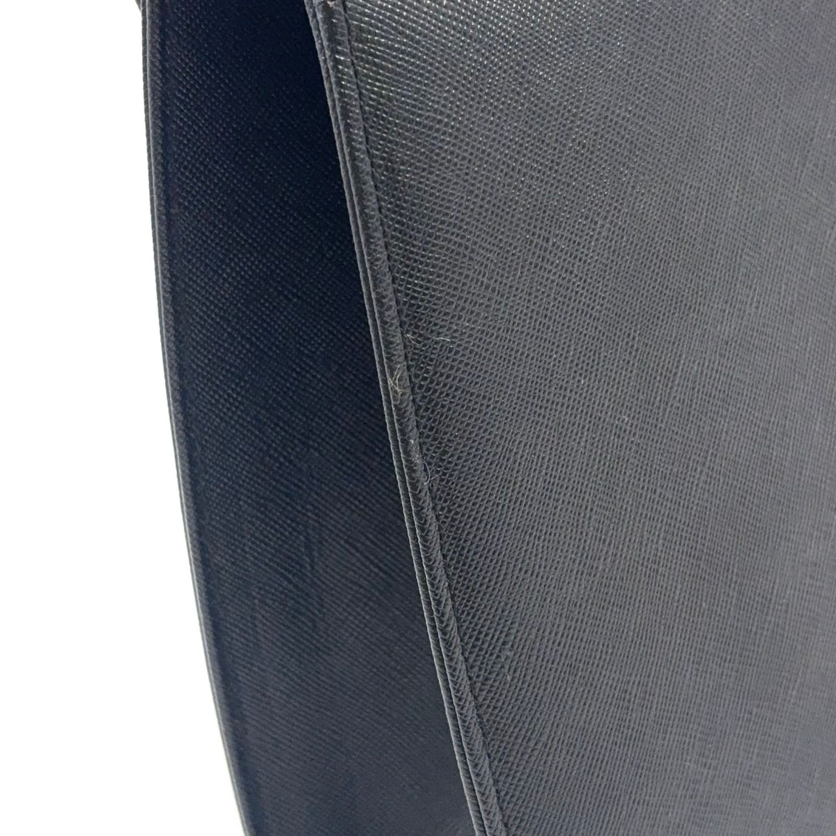 Saint Laurent Logo Embossed Leather Black Handbag Gold — view 7