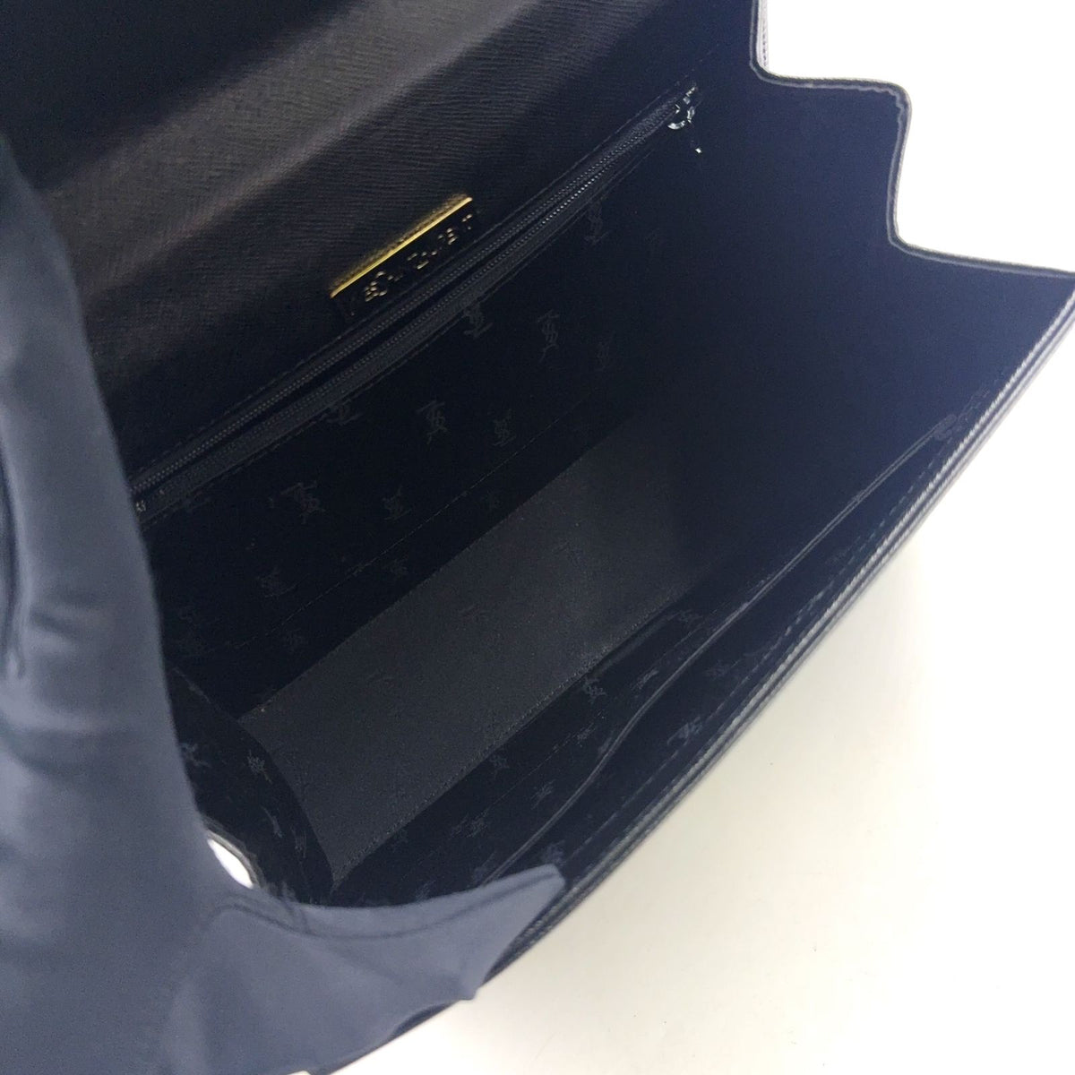 Saint Laurent Logo Embossed Leather Black Handbag Gold — view 3