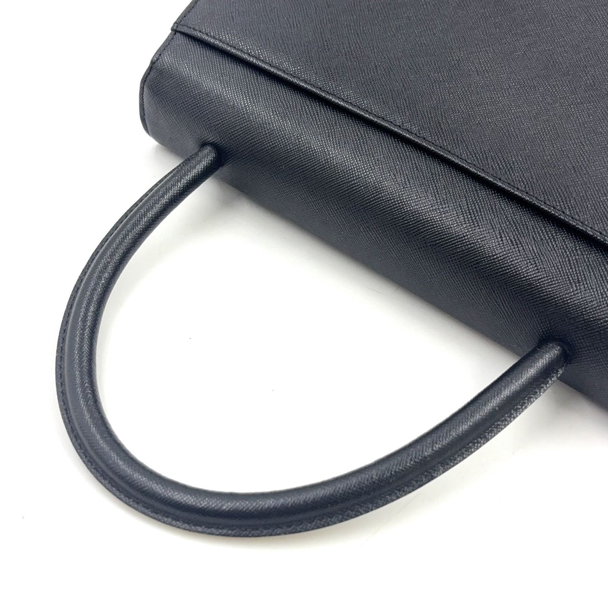 Saint Laurent Logo Embossed Leather Black Handbag Gold — view 6