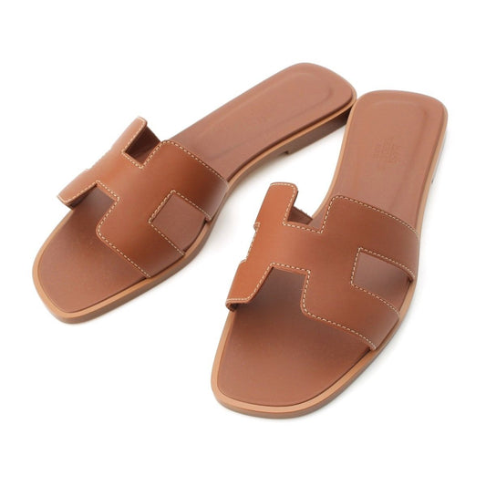 Hermes Oran Leather Sandals Gold