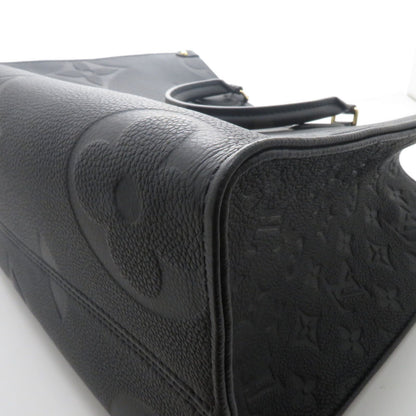 Louis Vuitton on the Go MM Monogram Empreinte Noir Tote Tag Stamp — view 6