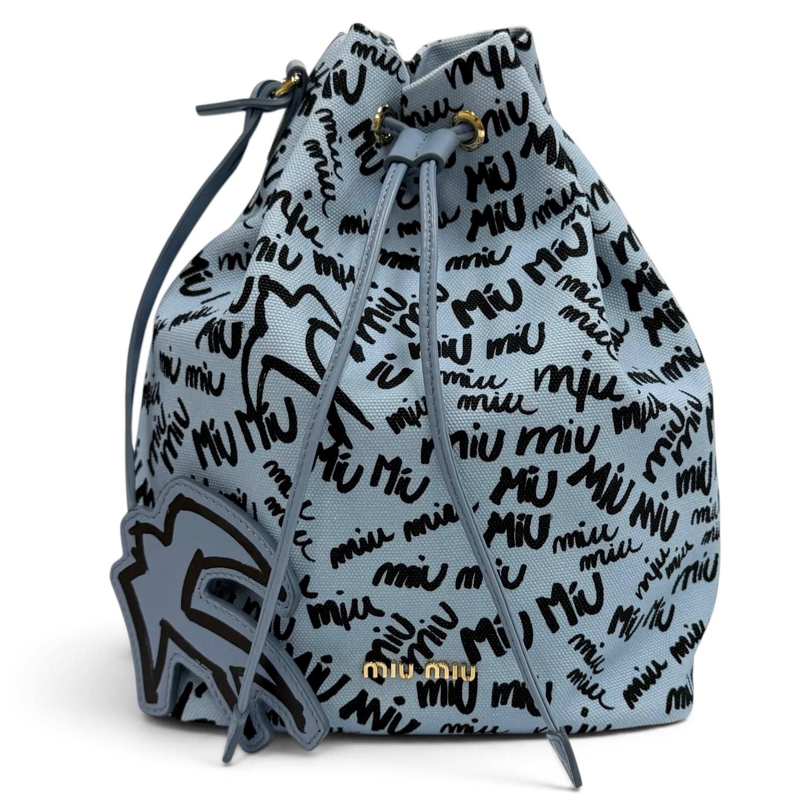 Miu Miu Canvas Logo All Over Print Bird Motif Drawstring Bag Light Blue Black