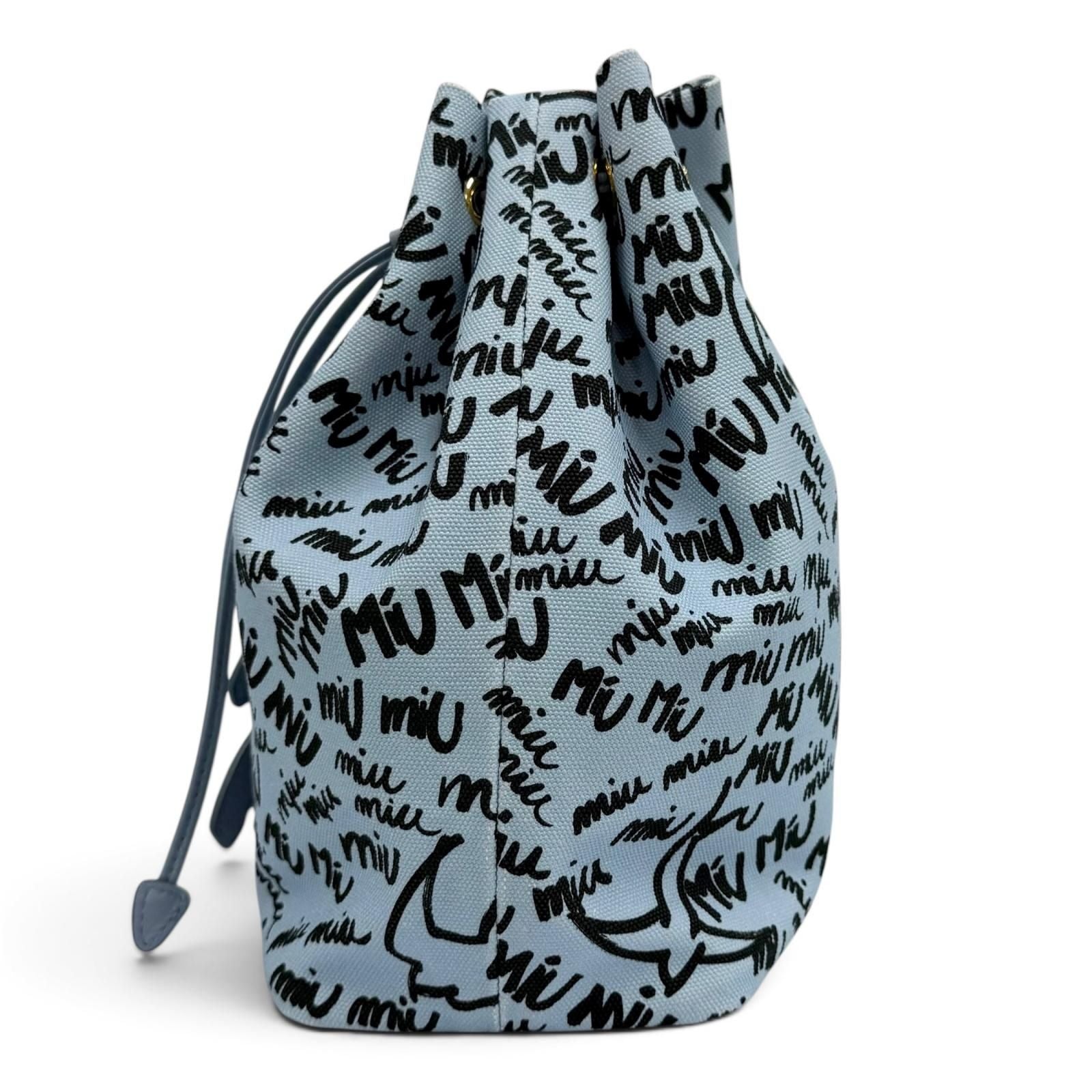 Miu Miu Canvas Logo All Over Print Bird Motif Drawstring Bag Light Blue Black — view 4
