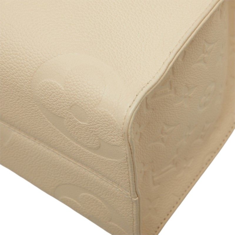 Louis Vuitton Monogram Empreinte on the Go MM Shoulder Bag Cream Ivory Leather — view 6