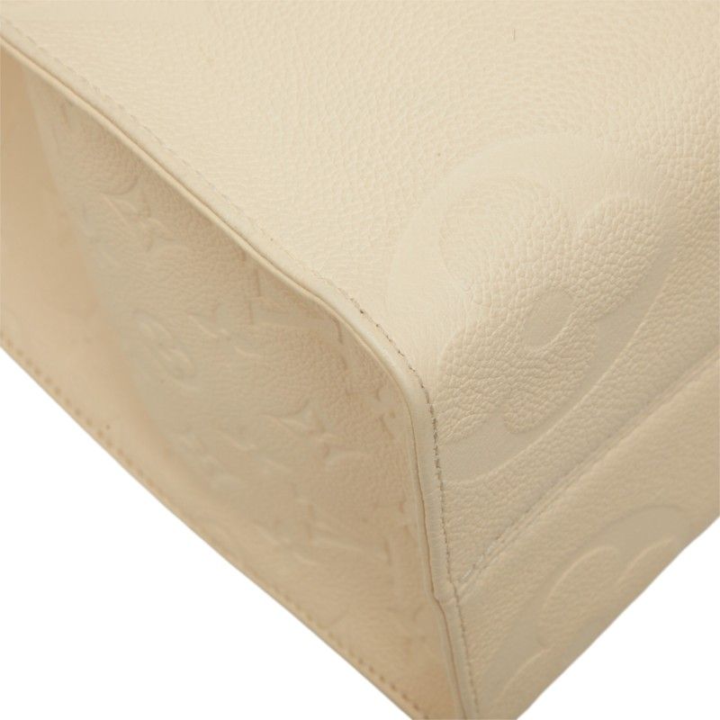 Louis Vuitton Monogram Empreinte on the Go MM Shoulder Bag Cream Ivory Leather — view 5