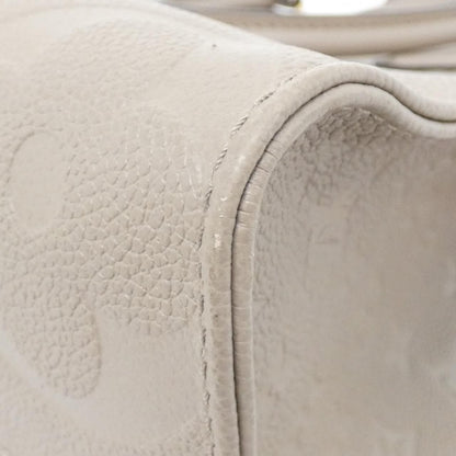 Louis Vuitton Monogram Empreinte on the Go MM Bag — view 2