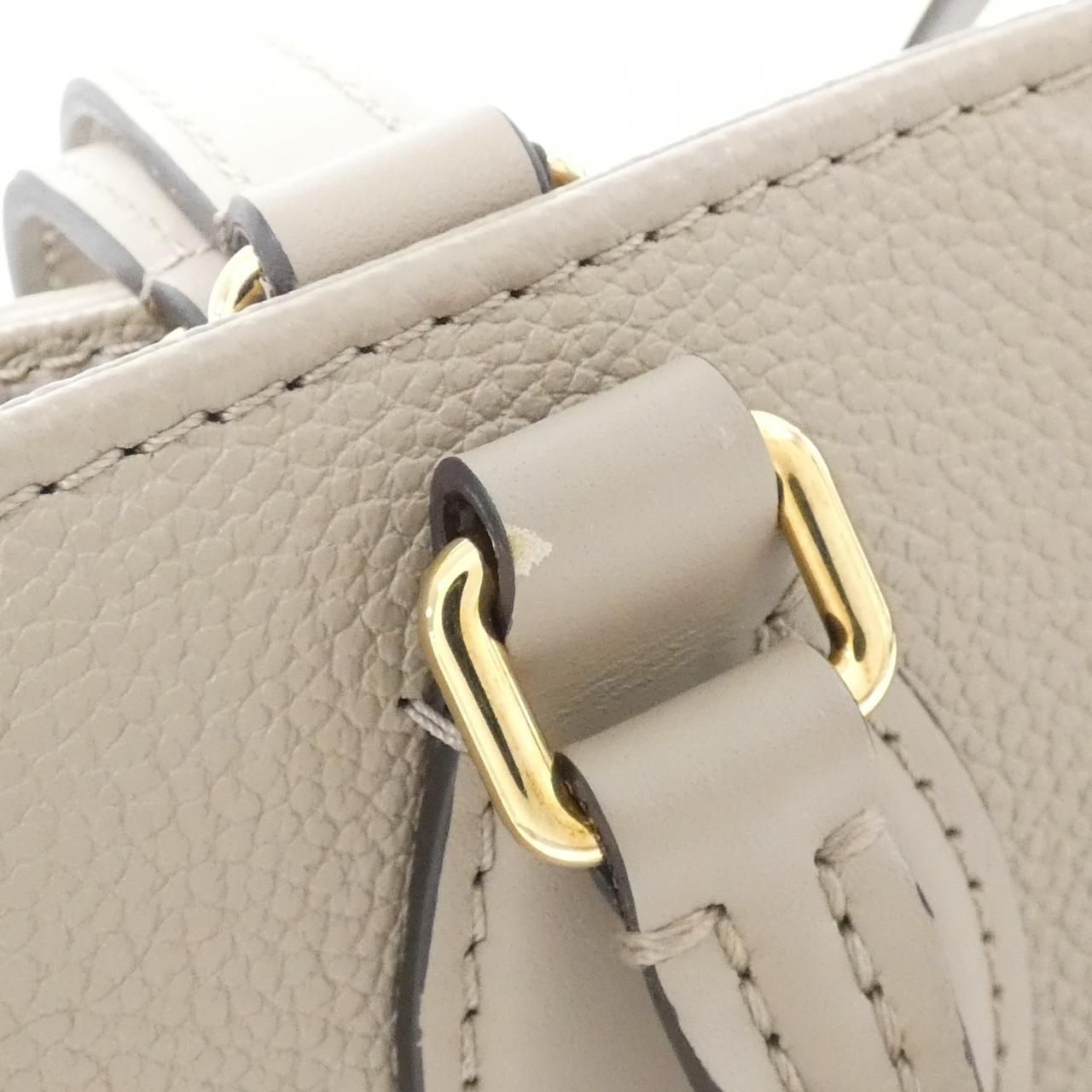 Louis Vuitton Monogram Empreinte on the Go MM Bag — view 4