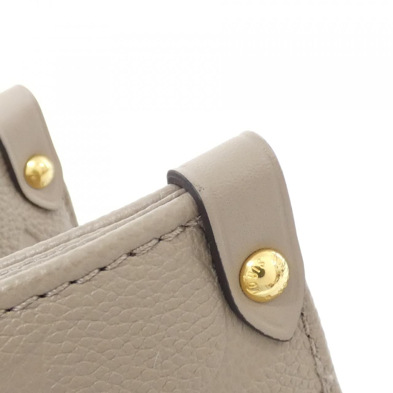 Louis Vuitton Monogram Empreinte on the Go MM Bag — view 3