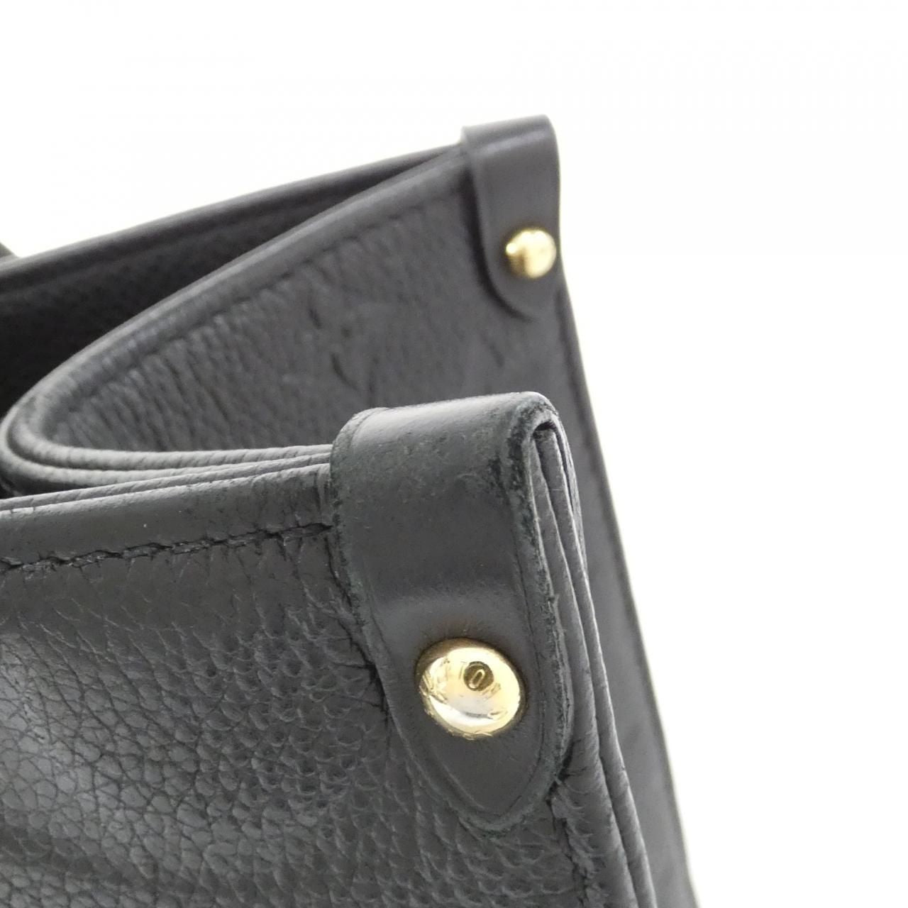 Louis Vuitton Monogram Empreinte on the Go MM Bag — view 4