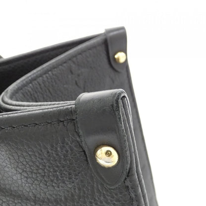 Louis Vuitton Monogram Empreinte on the Go MM Bag — view 4