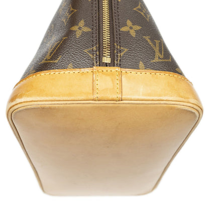 Louis Vuitton Alma Brown Monogram Canvas Handbag — view 7