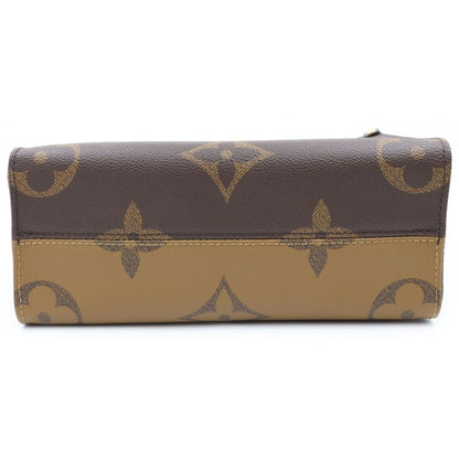 Louis Vuitton Monogram Giant Reverse on the Go PM Leather 2-Way Shoulder Bag — view 4