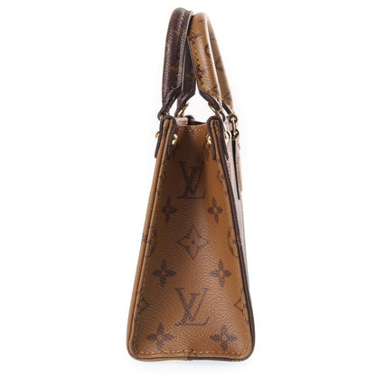 Louis Vuitton Monogram Reverse on the Go BB 2-Way Shoulder Bag Brown Leather — view 3