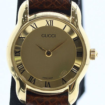 Gucci Round Gold Dial Watch