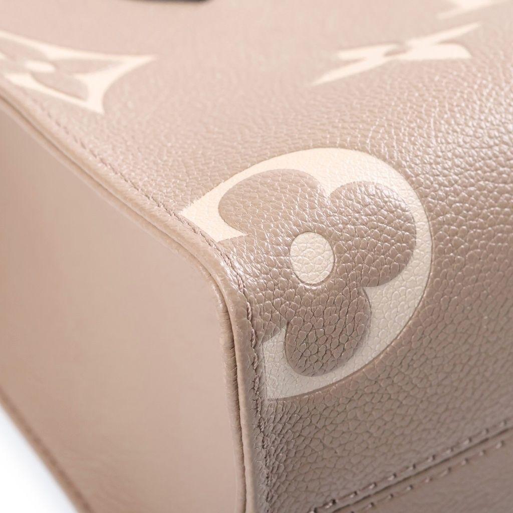 Louis Vuitton Monogram Giant Empreinte On The Go PM Tourterelle Cream 2-Way — view 5