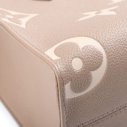 Louis Vuitton Monogram Giant Empreinte On The Go PM Tourterelle Cream 2-Way — view 5