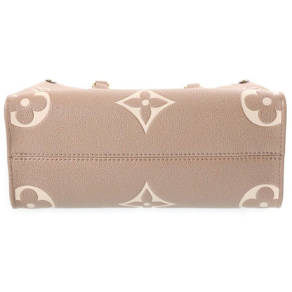 Louis Vuitton Monogram Giant Empreinte On The Go PM Tourterelle Cream 2-Way — view 4