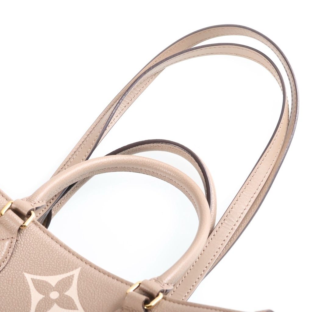 Louis Vuitton Bicolor Monogram Empreinte On The Go MM Tourterelle Cream Handbag — view 7