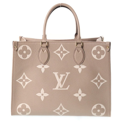 Louis Vuitton Bicolor Monogram Empreinte On The Go MM Tourterelle Cream Handbag — view 2