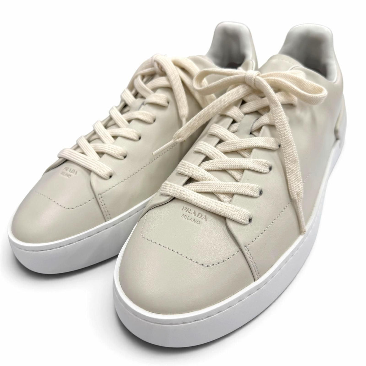 Prada Coat Leather Triangle Logo Plate Sneakers Chalk White