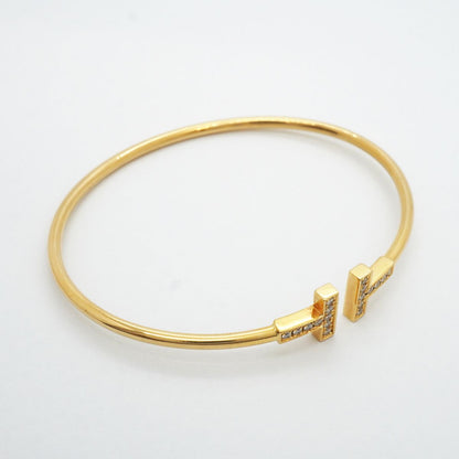 Tiffany & Co Bangle T Wire 18k Yellow Gold Diamond Bracelet — view 2