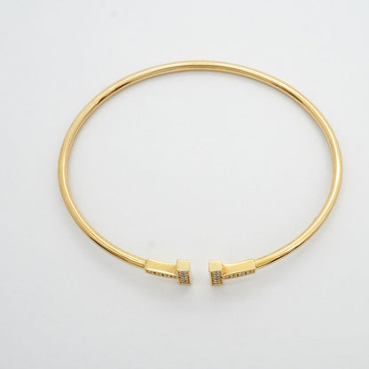 Tiffany & Co Bangle T Wire 18k Yellow Gold Diamond Bracelet — view 3