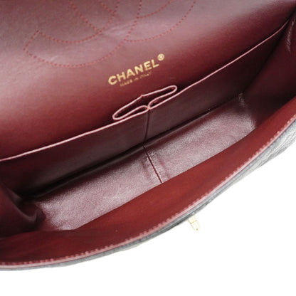 Chanel Shoulder Bag Maxi Quilted Caviar Leather Black Gold — view 4