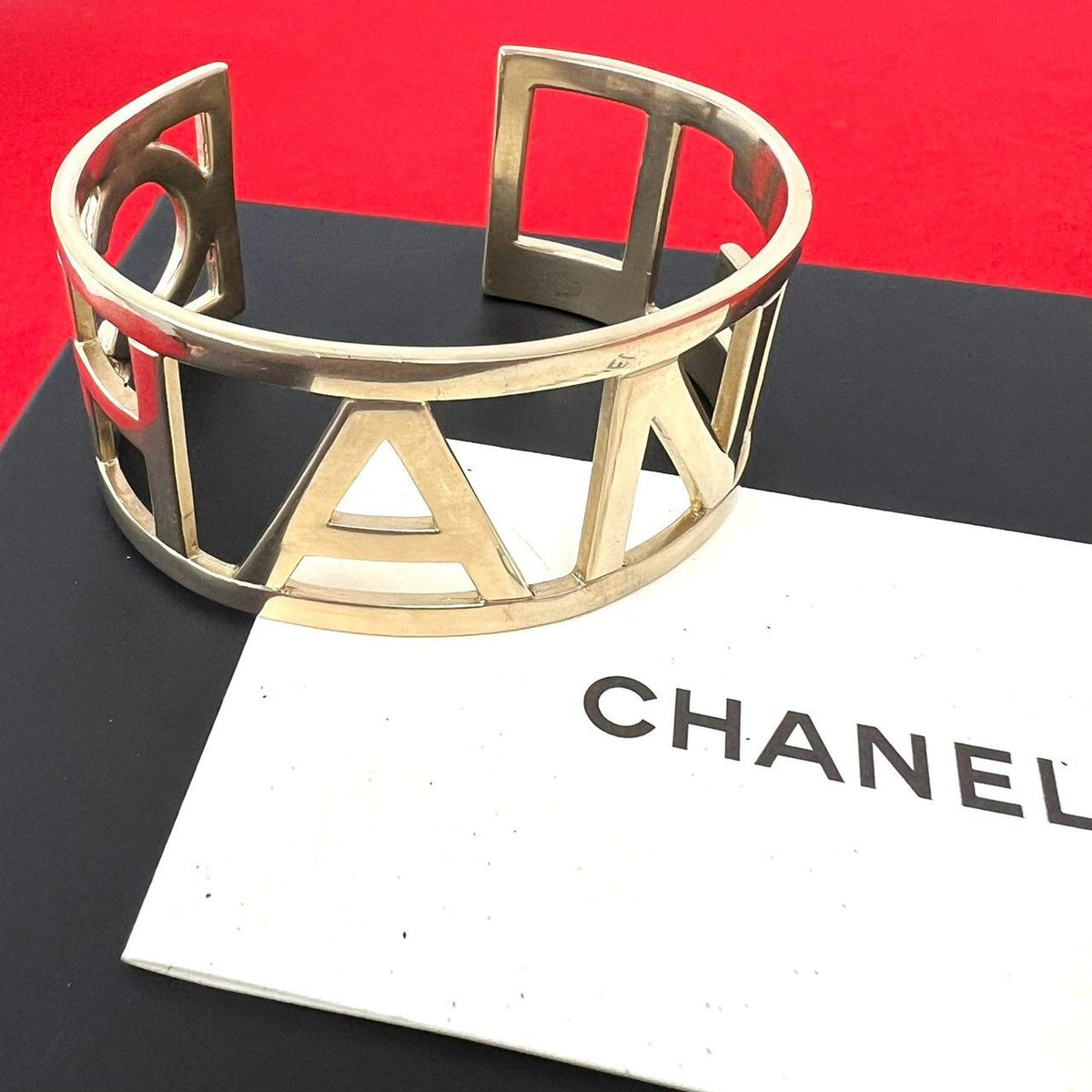 Chanel Comment Logo Bangle Gold Bracelet