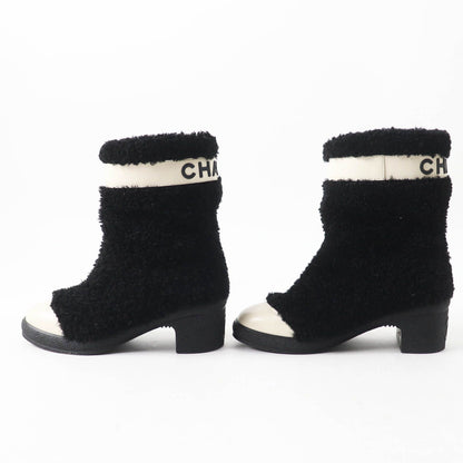 Chanel CC Logo Leather Shearling Boots Short Black White — view 3