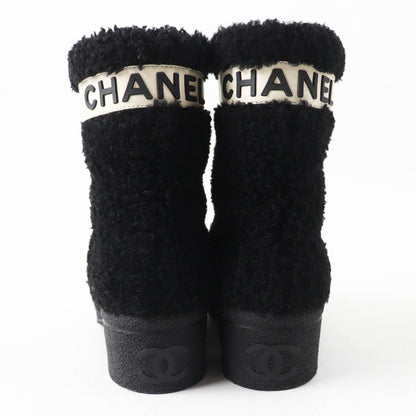 Chanel CC Logo Leather Shearling Boots Short Black White — view 2