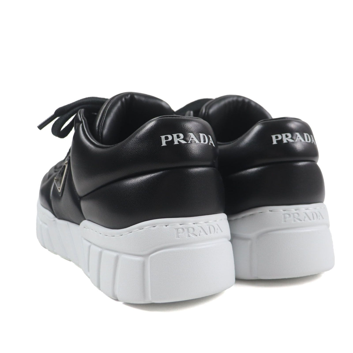 Prada Triangle Logo Plate Padded Nappa Leather Sneakers Black — view 4