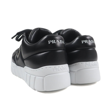 Prada Triangle Logo Plate Padded Nappa Leather Sneakers Black — view 4