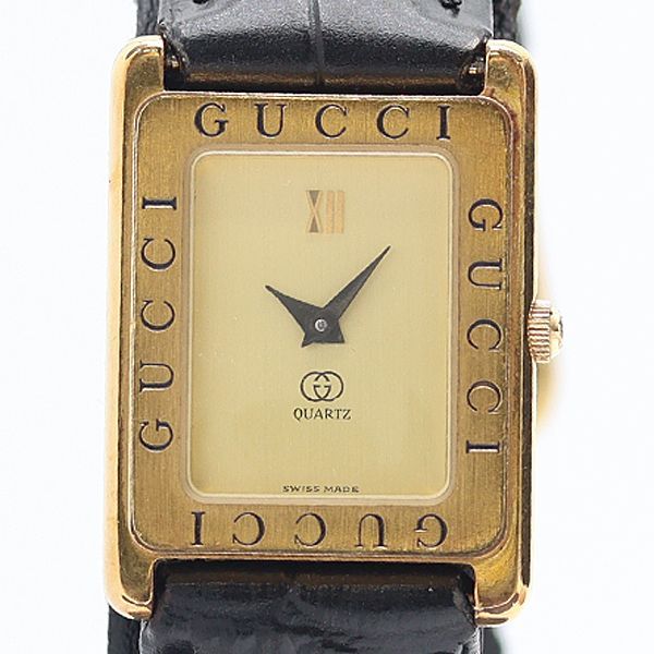 Gucci Gold Dial Watch
