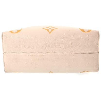 Louis Vuitton Monogram Empreinte On The Go MM Handbag Cream Saffron Beige — view 4