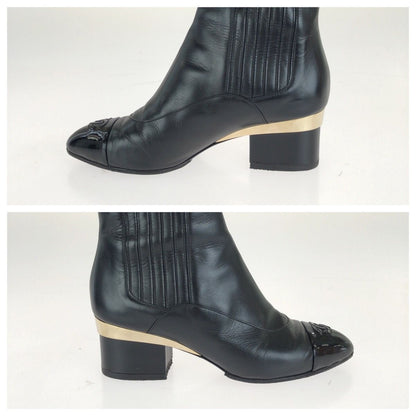 Chanel CC Logo Ankle Boots Heels Black Gold Leather — view 5