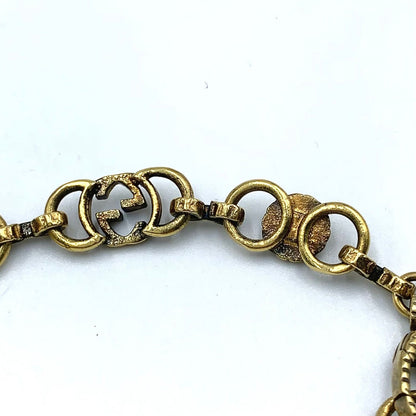 Gucci Interlocking G Flower Metal Gold Bracelet — view 7