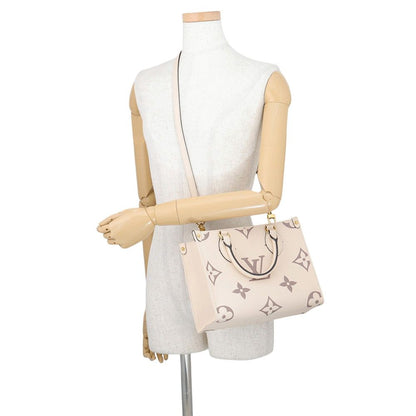Louis Vuitton Monogram Empreinte On The Go PM 2-Way Shoulder Bag — view 4