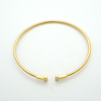 Tiffany & Co Bangle T Wire Narrow 18K Yellow Gold Bracelet — view 3