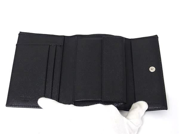 Prada 1m0840 Tessuto Nylon And Saffiano Leather Bifold Wallet Black