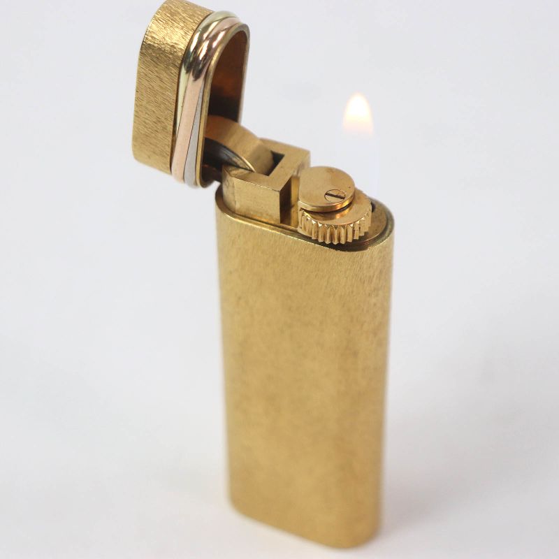 Cartier Trinity Oval New Shape Smoking Tool Gas Lighter Gold Swiss Made Men's