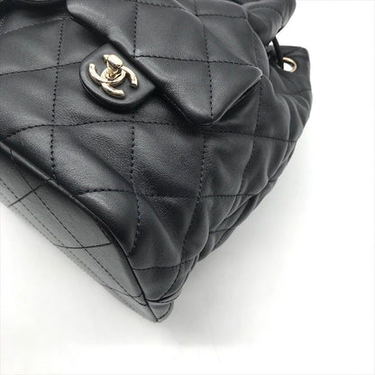 Chanel Quilted Lambskin CC Logo Drawstring Chain Backpack Pack Black