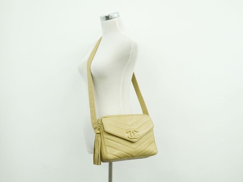 Authentic Chanel Coco Mark V Stitch Tassel Shoulder Bag Pochette Leather Beige