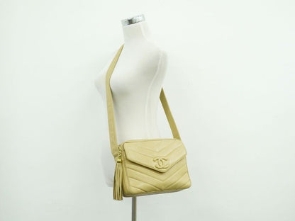 Authentic Chanel Coco Mark V Stitch Tassel Shoulder Bag Pochette Leather Beige