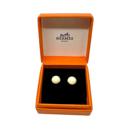 Hermes Eclipse Pierced Earrings Silver and White on Both Ears